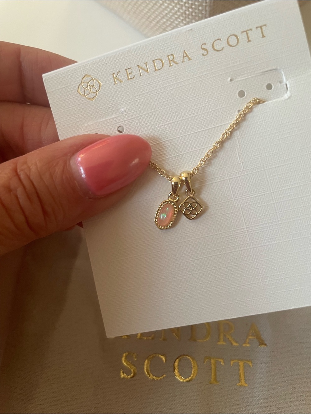 Kendra Scott Gold Necklace with Peach Opal and Logo Charms